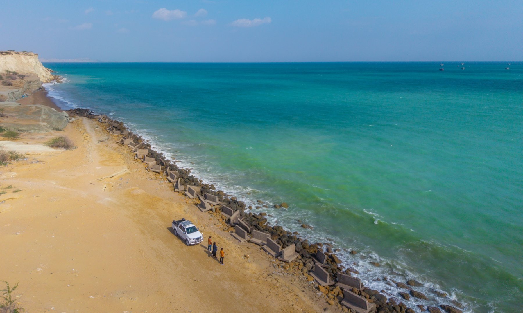 Kund Malir beach — golden sand and turquoise water where the desert meets the Arabian Sea