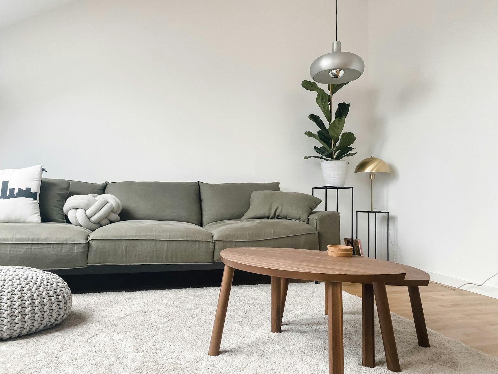 Living room wall with an Asmar Hussain fine-art print hanging above the sofa